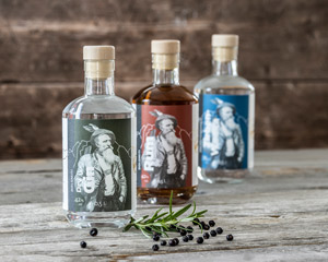 Dolomitenmann Produkte: Gin, Rum und Zirben-Wodka